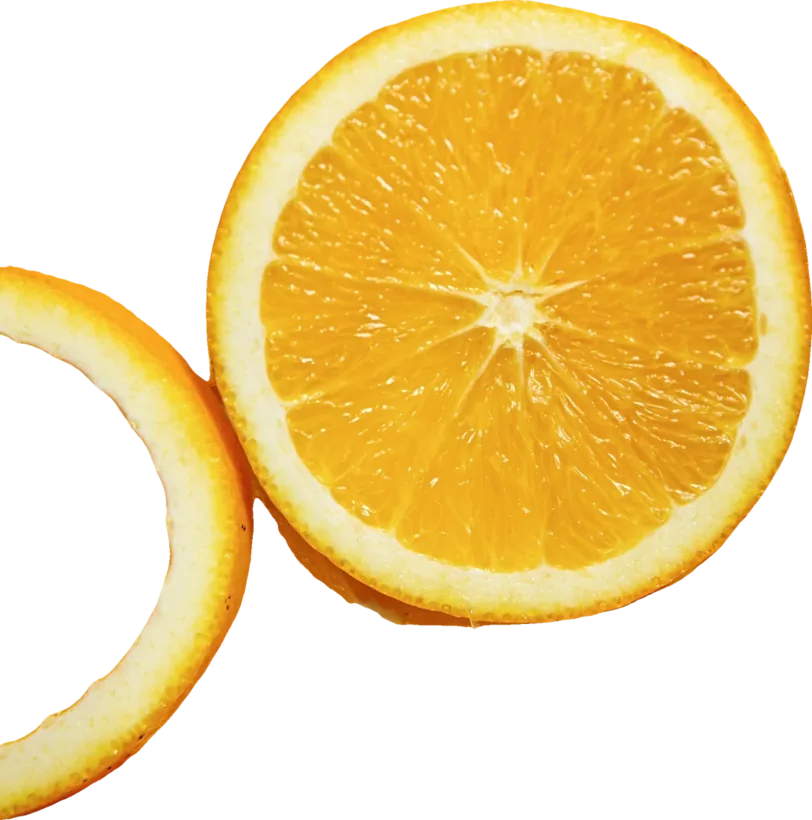 A whole orange with a green leaf